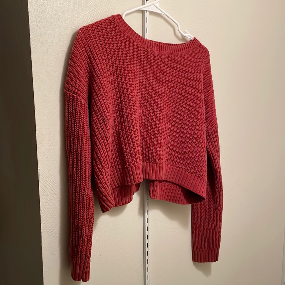 Sweater crop top with an open back